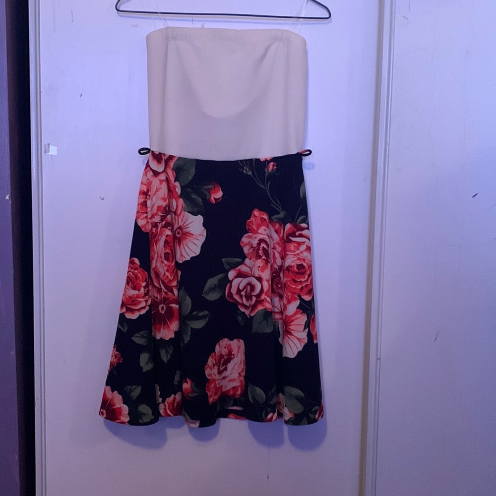 White at the top flower at the bottom dress